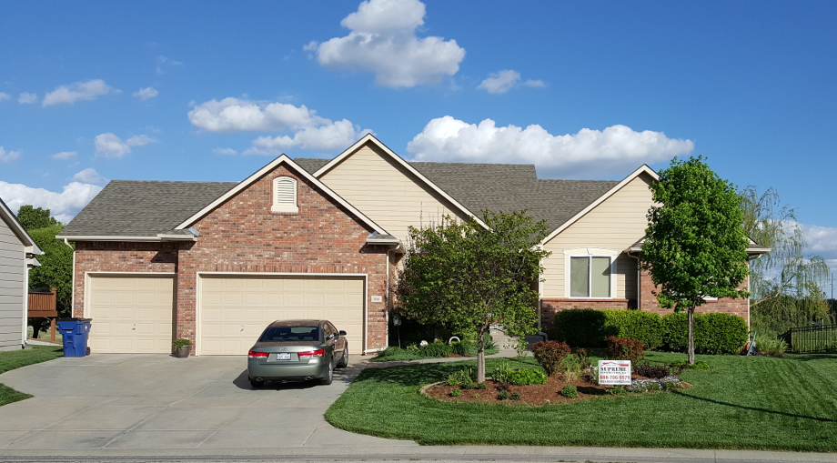 Image of a home with the Supreme Construction yardsign.